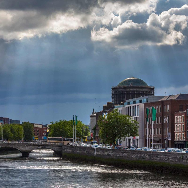 Moody clouds over dublin city, overlooking the river